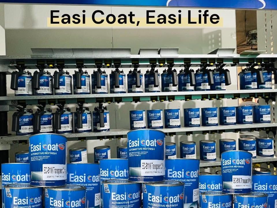 Retail shelf of EasiCoat car paint tins under an Easi Coat, Easi Life banner